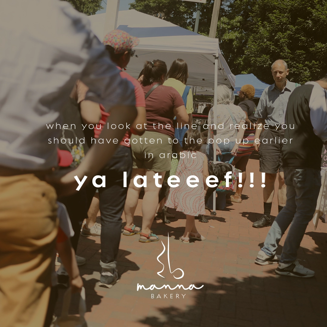 People standing in line outdoors at a pop-up market with a text overlay about realizing you should have arrived earlier, highlighting 'ya lateeef!!!' and the Manna Bakery logo.